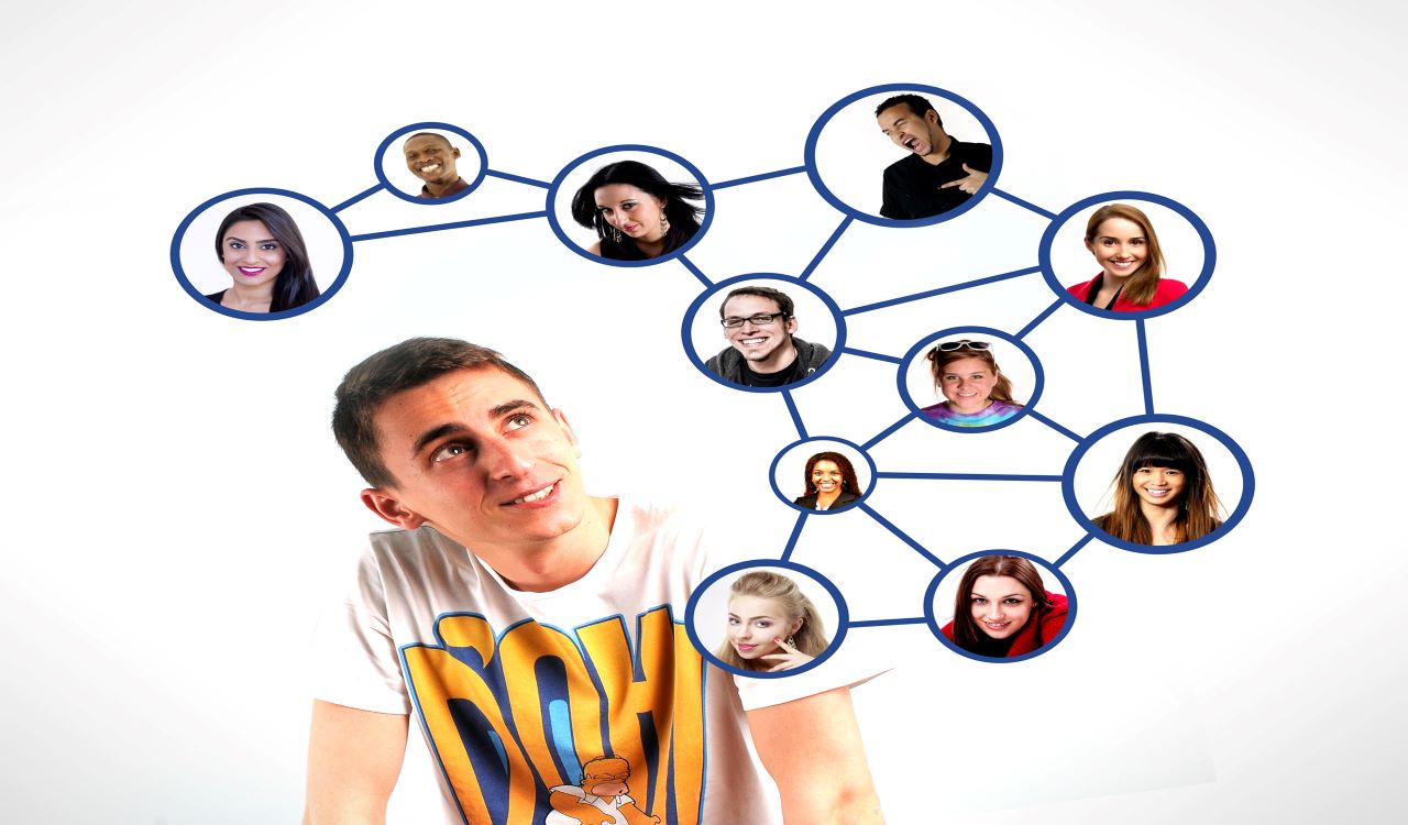 A man looking at his social network connections